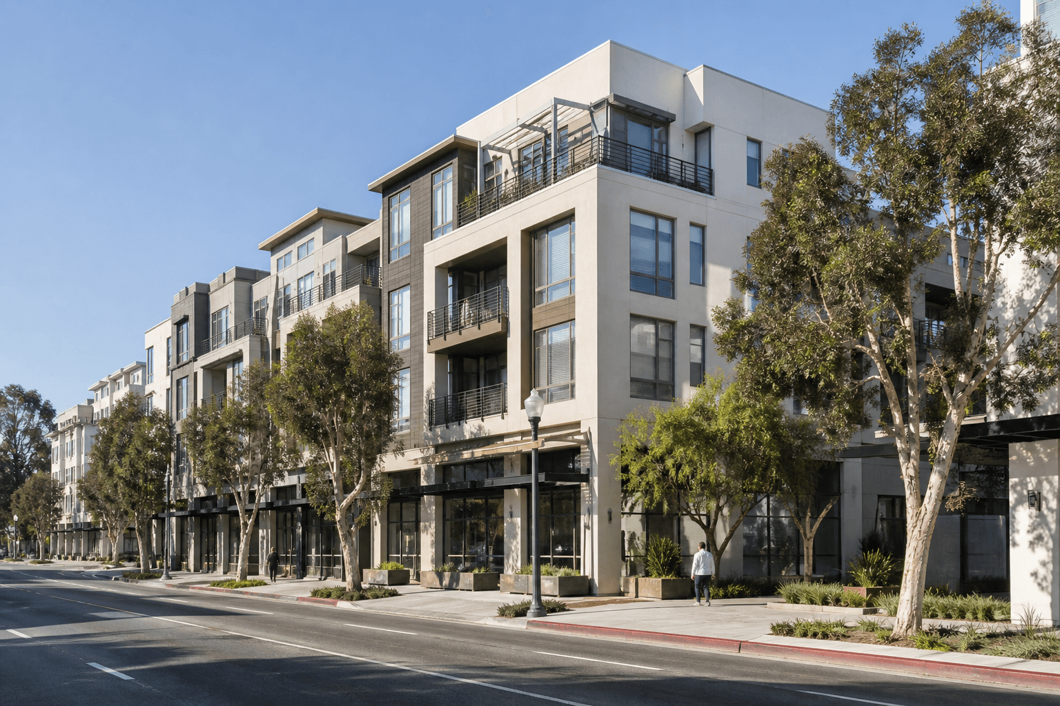 Street-level view of a contemporary mixed-use neighborhood.
